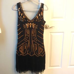 1920's Flapper Costume in black and gold, with headpiece and elbow length gloves